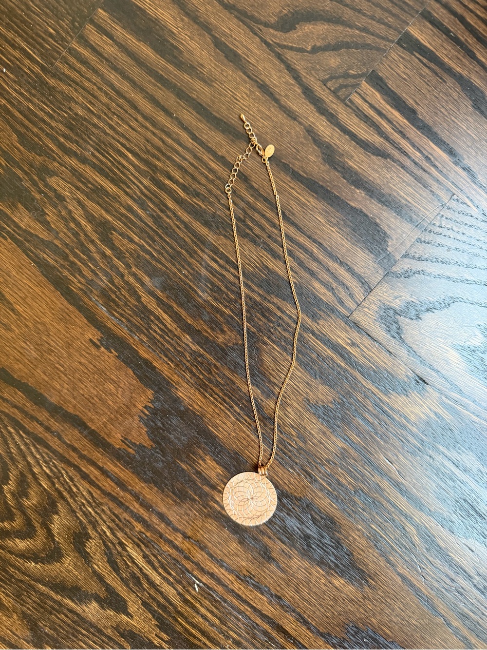 Nolan Miller rose gold toned round pendant necklace